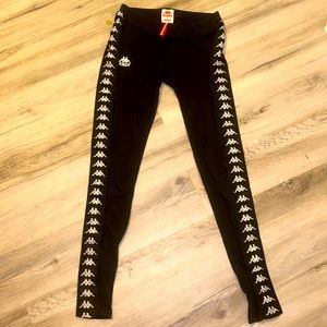 kappa leggings size medium All black with white kappa girls design down each leg